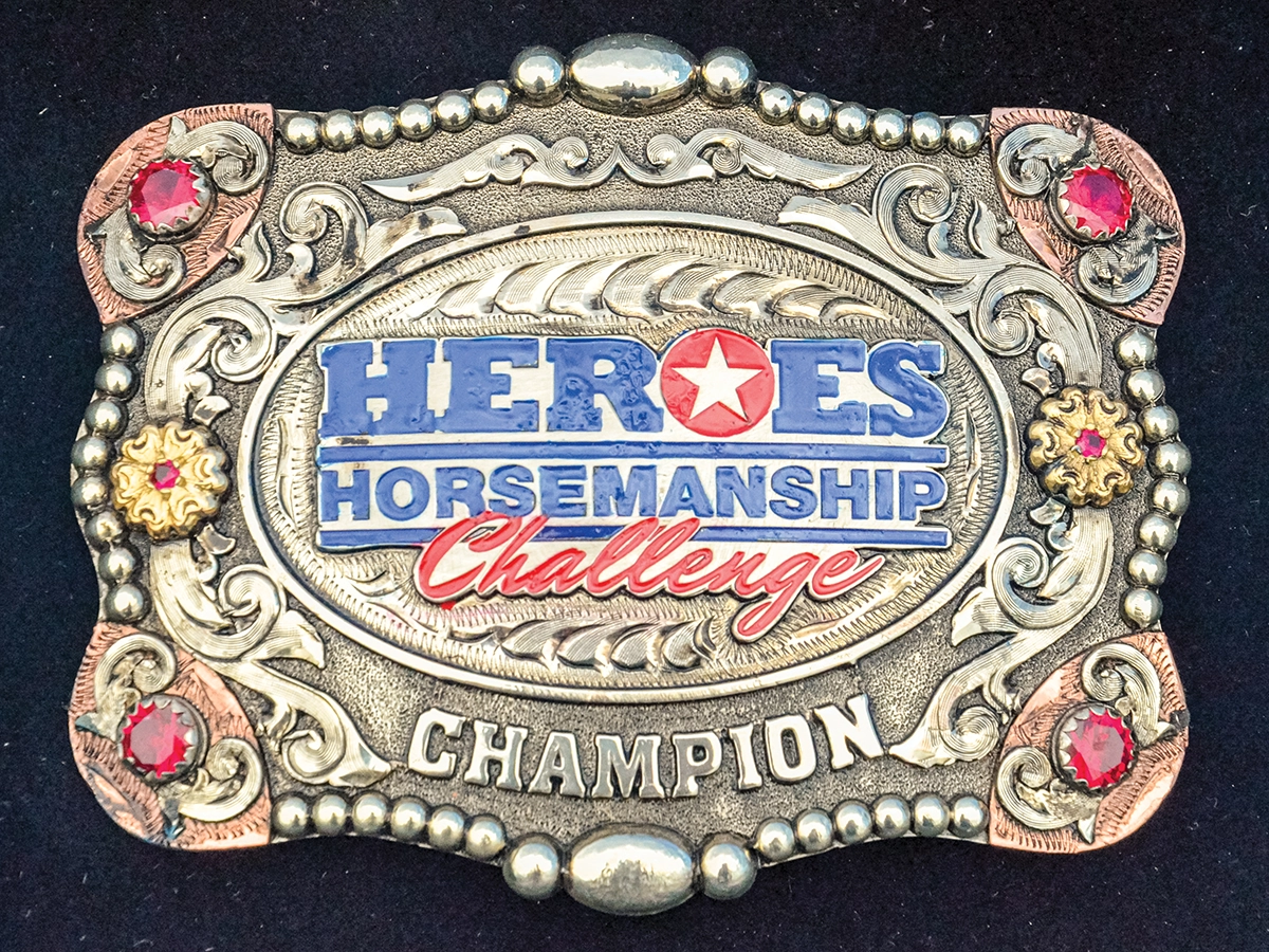 A Heroes Horsemanship Challenge belt buckle.
