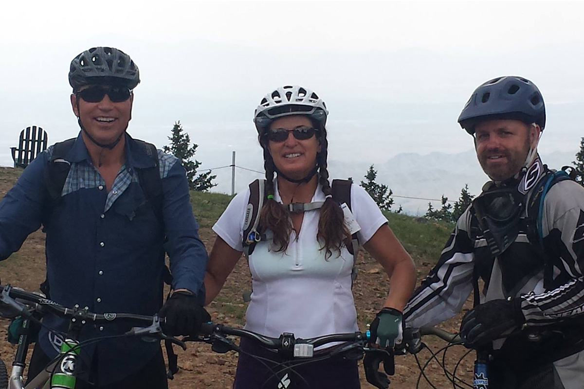 Julie and her family mountain biking