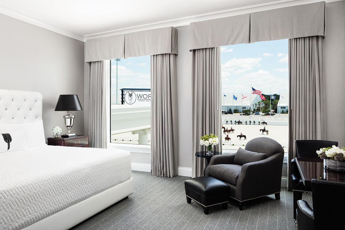 A hotel room at the World Equestrian Center in Ocala overlooks a show ring