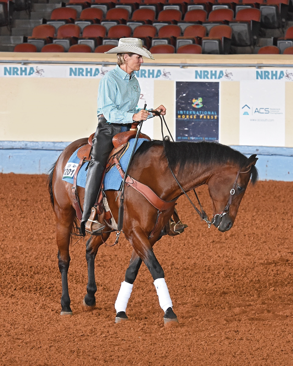 A horse and rider beginning their spins.