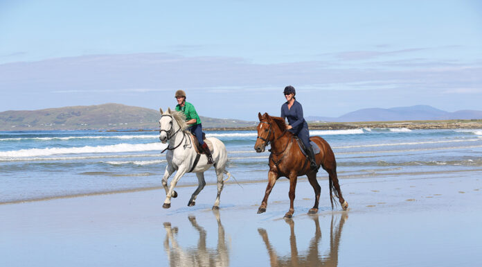 A Horseback Riding Holiday in Ireland Horseback riding on a beach in Ireland on holiday.