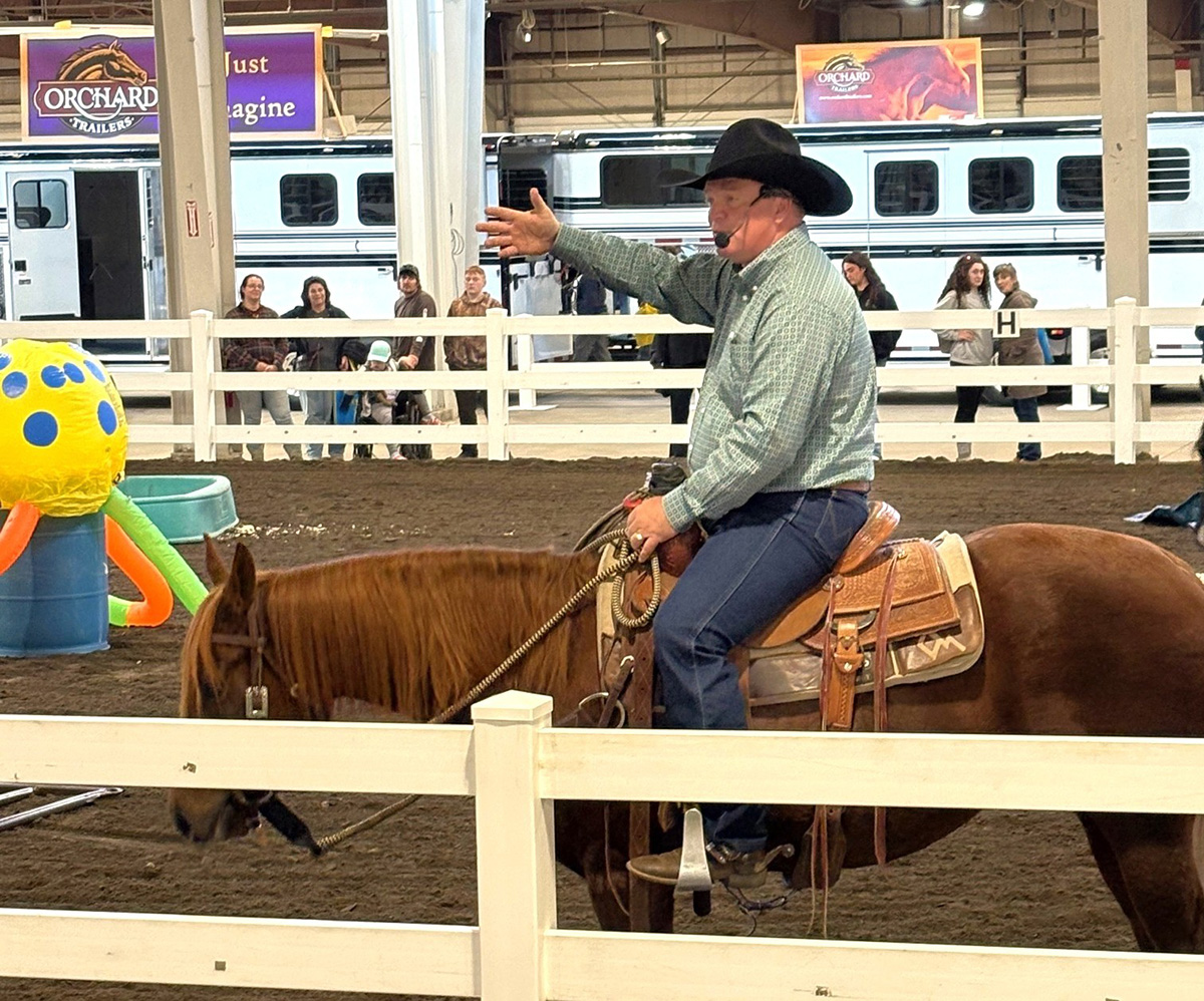 Ken McNabb demonstrates how to build courage and confidence when confronting spooky obstacles in a clinic at Equine Affaire Massachusetts 2025.