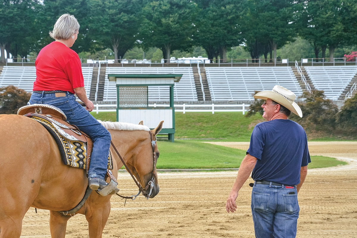 Trainer Carey Ready coaching the winning team in the 2024 Heroes Horsemanship Challenge.