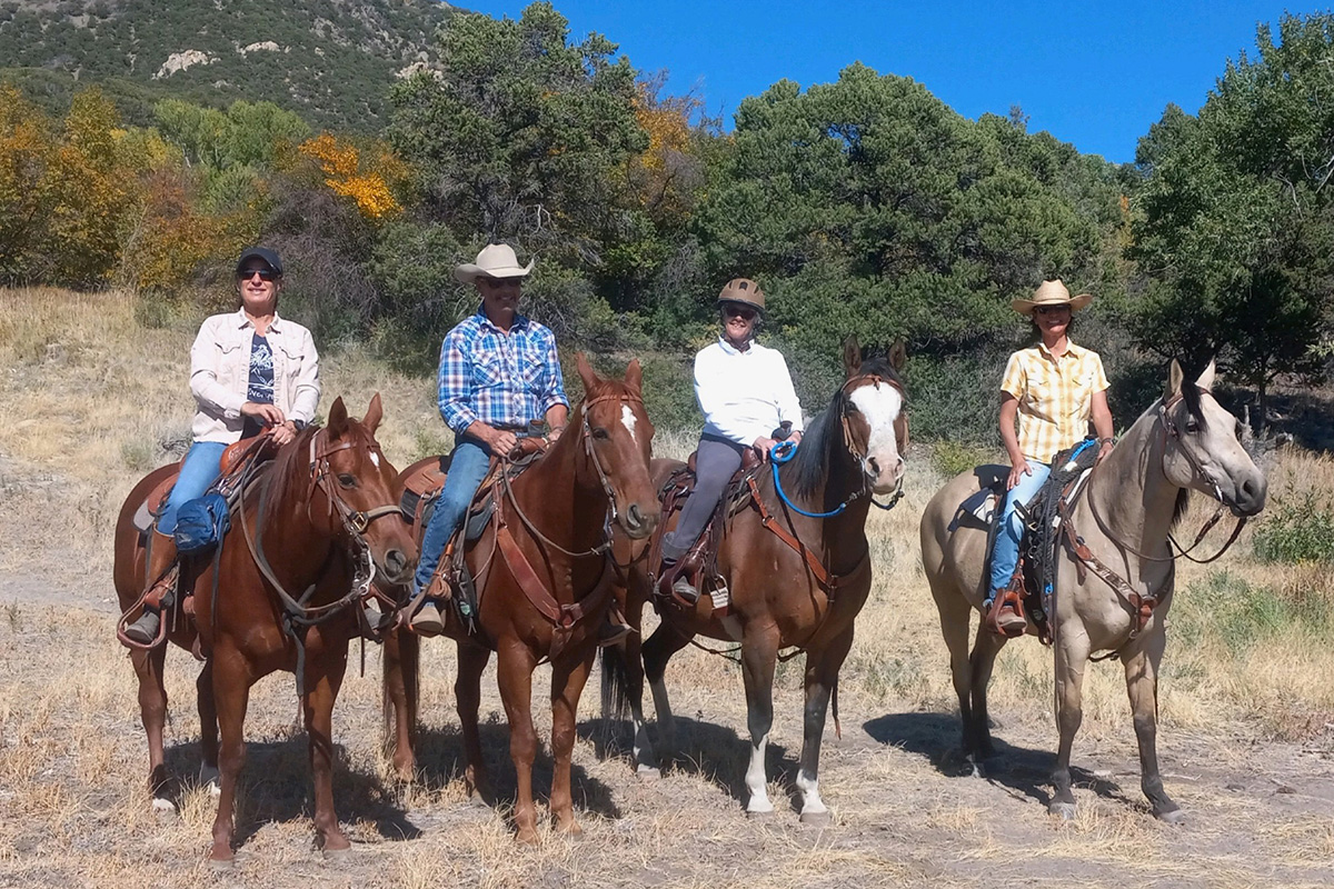 Julie Goodnight, Rich and friends trail riding at the base of the Sangre de Cristo Mountains