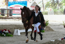 Eventing Begins at Santiago 2023 Pan American Games Liz Halliday jogging for eventing at the Pan American Games