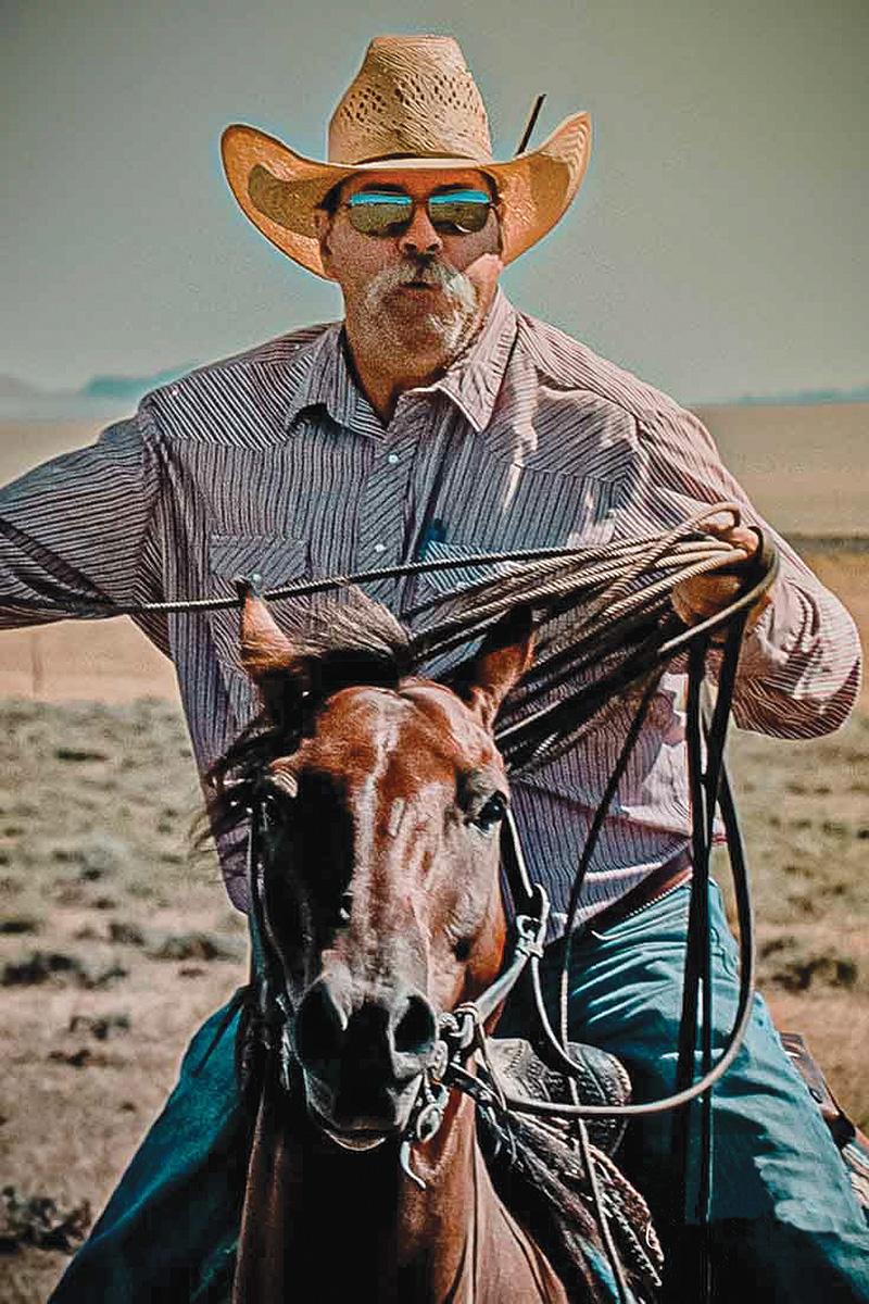 A head-on of a cowboy galloping his horse