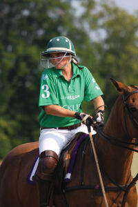 Nicole Wozniak playing polo