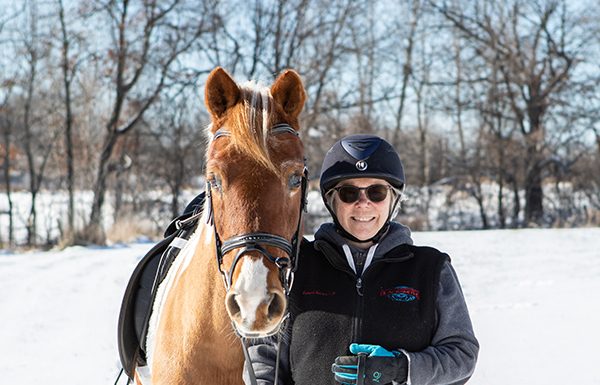 winter riding goals with your horse - Andrea Becker with her horse, Skittles