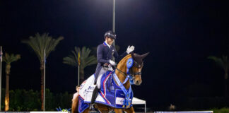 Ben Ebeling and Bellana celebrate with a victory gallop at the US Equestrian Open Dressage Final.