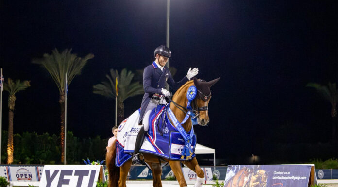 Ben Ebeling and Bellana celebrate with a victory gallop at the US Equestrian Open Dressage Final.