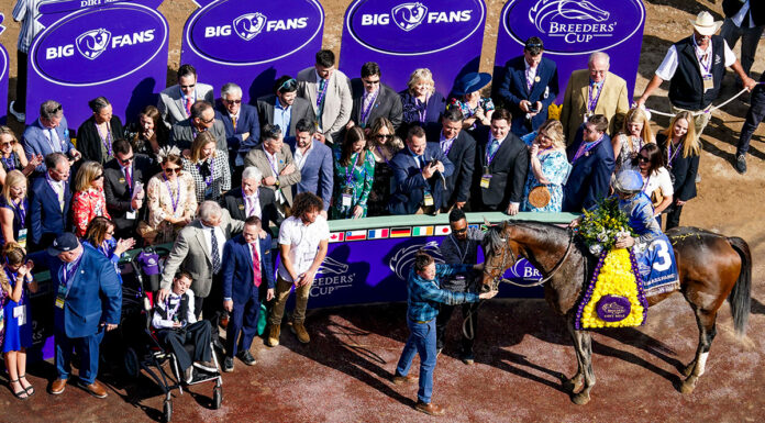 Cody Dorman joins Cody's Wish in the winner's circle of the Breeders' Cup Dirt Mile