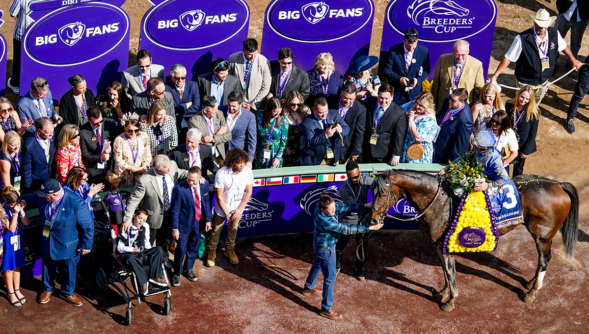 Cody Dorman joins Cody's Wish in the winner's circle of the Breeders' Cup Dirt Mile