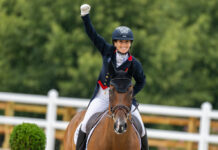 Laura Collett celebrates aboard London 52 after setting an Olympic record with a score of 17.5 in eventing dressage during equestrian sport