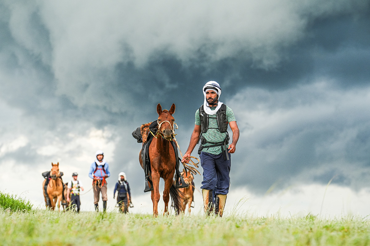 Riders leading their Mongolian horses