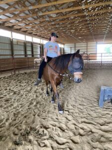Nomad working lightly under saddle with guidance despite his blindness.