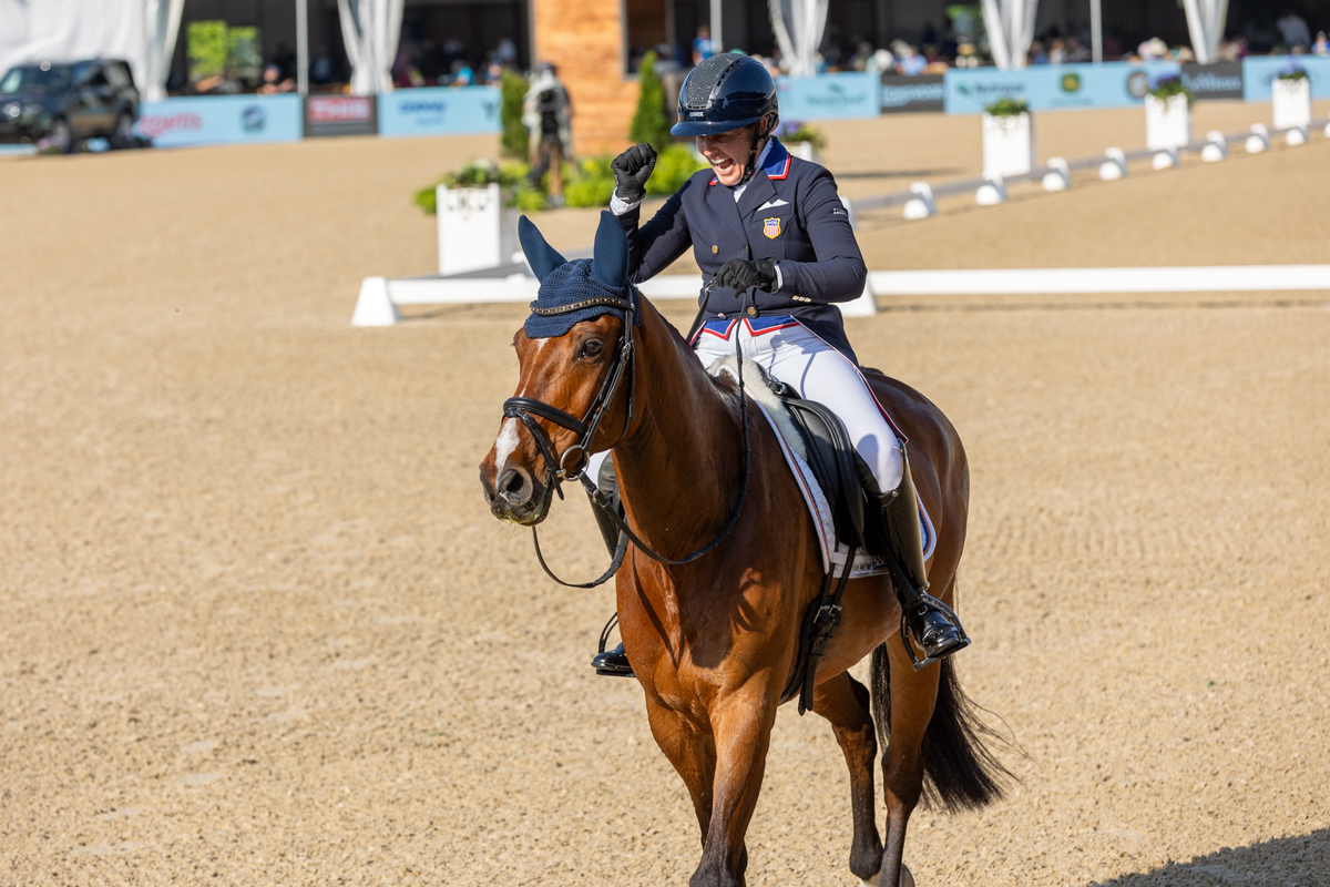 Sharon White celebrates a great test aboard Claus 63.