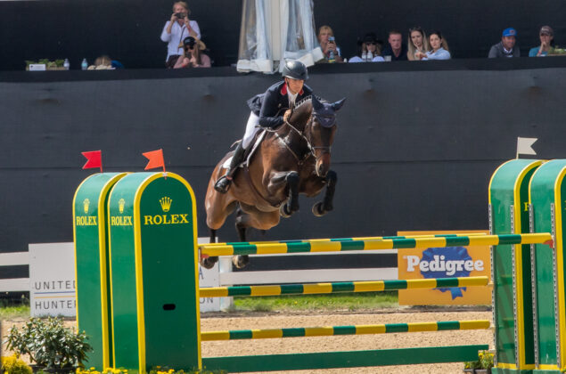 Tom McEwen and JL Dublin clear the Rolex fence