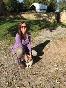 Woman with small dog.