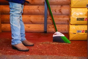 Sweeping up the tack room.