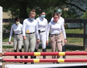 Masked riders at a schooling show