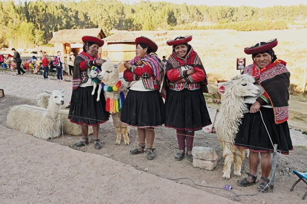 Cusco, Peru women with alpacas