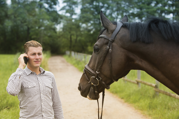 Horse Owner on Phone with Horse - Charge for a Veterinary Call