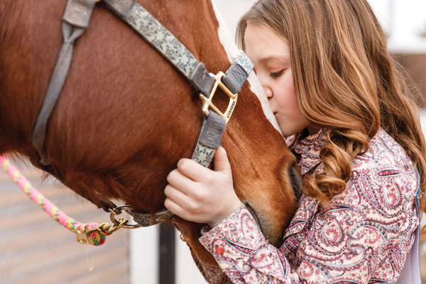 Girl Kissing Horse