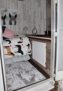 Living area in trailer with sink