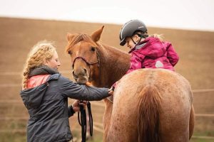 Little Girl on Mustang