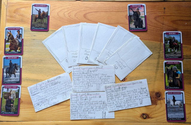 Horse breed trading cards Alyssa made as a kid.