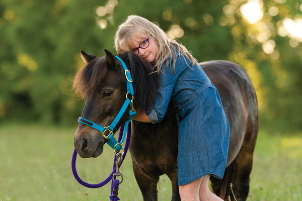 Megan's Daughter Owning a Miniature Horse