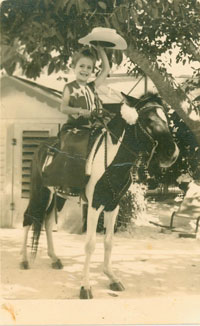 Olympic show jumper Margie Engle at five years old on her pony.